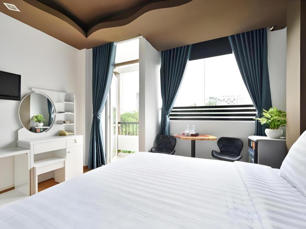 The Noble Swan Wood Park Hotel Хошимин Екстериор снимка